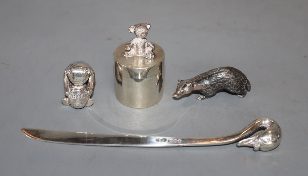 Four small silver novelty items by Sarah Jones, comprising Winnie-the-Pooh and Honeypot,
